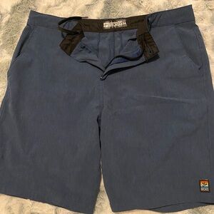 Very good condition, like new. Micros Blue Hybrid Shorts Performancce size 34